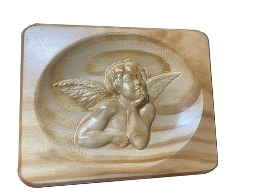 A Pine plaque with an angel