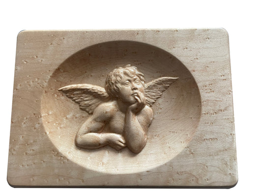 A Larch plaque with an angel